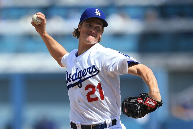 LOS ANGELES, CA - SEPTEMBER 28:  Pitcher Zack Greinke #21 of the Los Angeles Dodgers pitches in the first inning during the MLB game against the Colorado Rockies at Dodger Stadium on September 28, 2014 in Los Angeles, California.  (Photo by Victor Decolongon/Getty Images)