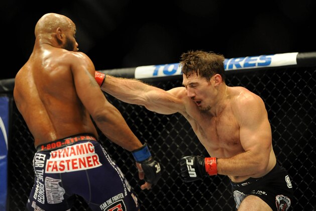 Sep 27, 2014; Las Vegas, NV, USA; Yoel Romero (blue gloves) fights Tim Kennedy (red gloves) during a middleweight fight during UFC 178 at MGM Grand Garden Arena. Mandatory Credit: Stephen R. Sylvanie-USA TODAY Sports