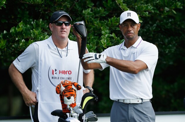 WINDERMERE, FL - DECEMBER 03:  Tiger Woods waits alongside his caddie Joe LaCava during the pro-am prior to the start of the Hero World Challenge at the Isleworth Golf & Country Club on December 3, 2014 in Windermere, Florida.  (Photo by Scott Halleran/Getty Images)