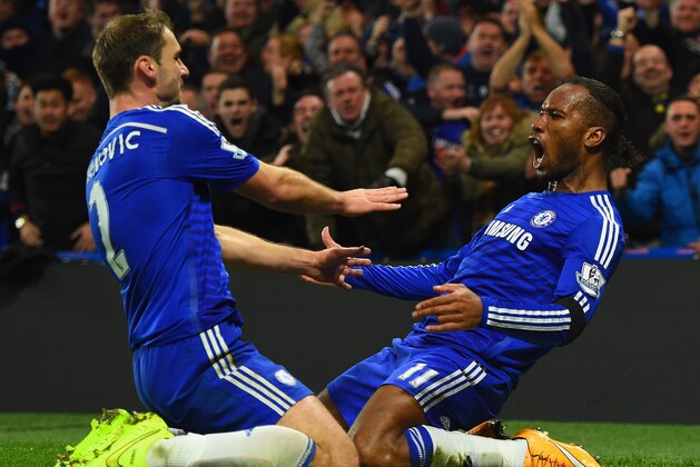 LONDON, ENGLAND - DECEMBER 03:  Didier Drogba of Chelsea celebrates scoring their second goal with Branislav Ivanovic of Chelsea during the Barclays Premier League match between Chelsea and Tottenham Hotspur at Stamford Bridge on December 3, 2014 in London, England.  (Photo by Shaun Botterill/Getty Images)