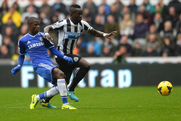 NEWCASTLE UPON TYNE, ENGLAND - NOVEMBER 02:  Cheick Tiote of Newcastle United and Ramires of Chelsea during the Barclays Premier League match between Newcastle United and Chelsea at St James' Park on November 02, 2013 in Newcastle upon Tyne, England. (Photo by Mark Runnacles/Getty Images)