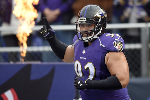 Baltimore Ravens defensive end Haloti Ngata runs onto the field as he is introduced before an NFL football game against the San Diego Chargers, Sunday, Nov. 30, 2014, in Baltimore. (AP Photo/Nick Wass)