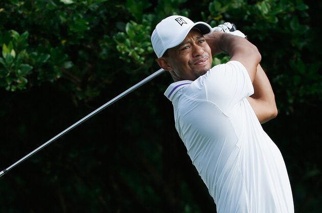 WINDERMERE, FL - DECEMBER 03:  Tiger Woods hits a shot during the pro-am prior to the start of the Hero World Challenge at the Isleworth Golf & Country Club on December 3, 2014 in Windermere, Florida.  (Photo by Scott Halleran/Getty Images)