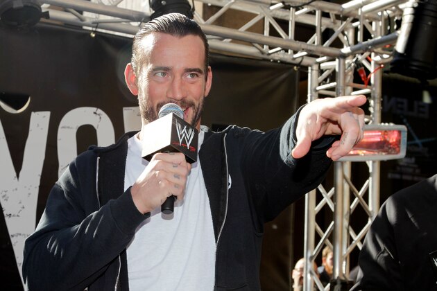 WWE Superstar CM Punk addresses the crowd at Madison Square Garden, Friday, Nov. 18, 2011, in New York, during a rally leading up to the 25th Anniversary of Survivor Series, taking place Sunday at Madison Square Garden.  The event will feature actor and wrestling favorite Dwayne