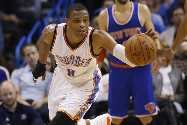 Oklahoma City Thunder guard Russell Westbrook heads upcourt with a steal in the third quarter of an NBA basketball game against the New York Knicks in Oklahoma City, Friday, Nov. 28, 2014. Oklahoma City won 105-78. (AP Photo/Sue Ogrocki)