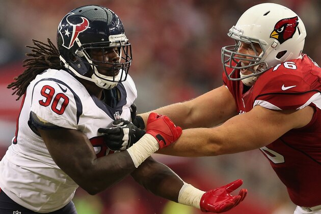 GLENDALE, AZ - AUGUST 09:  Linebacker Jadeveon Clowney #90 of the Houston Texans battles for position with offensive tackle Nate Potter #76 of the Arizona Cardinals during the preseason NFL game at the University of Phoenix Stadium on August 9, 2014 in Glendale, Arizona.  The Cardinals defeated the Texans 32-0.  (Photo by Christian Petersen/Getty Images)