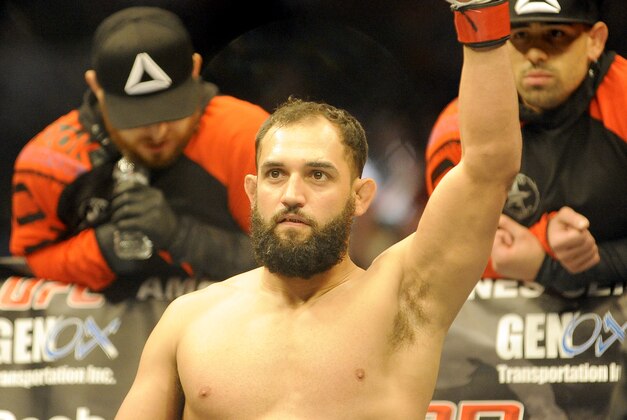 Johny Hendricks is announced to the crowd before a UFC 171 mixed martial arts welterweight title bout, Saturday, March 15, 2014, in Dallas. Hendricks won by decision. (AP Photo/Matt Strasen)
