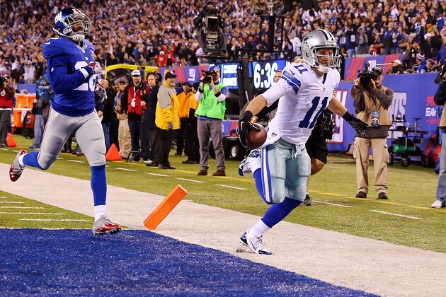 EAST RUTHERFORD, NJ - NOVEMBER 23:  Cole Beasley #11 of the Dallas Cowboys carries a reception in for a 45 yard touchdown in the third quarter against the New York Giants at MetLife Stadium on November 23, 2014 in East Rutherford, New Jersey.  (Photo by Elsa/Getty Images)
