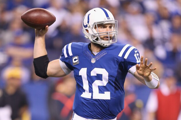 INDIANAPOLIS, IN - NOVEMBER 30:  Andrew Luck #12 of the Indianapolis Colts throws a pass during the game against the Washington Redskins at Lucas Oil Stadium on November 30, 2014 in Indianapolis, Indiana.  (Photo by Andy Lyons/Getty Images)