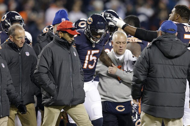 Chicago Bears wide receiver Brandon Marshall (15) walks off the field during the first half of an NFL football game against the Dallas Cowboys Thursday, Dec. 4, 2014, in Chicago. (AP Photo/Nam Y. Huh)