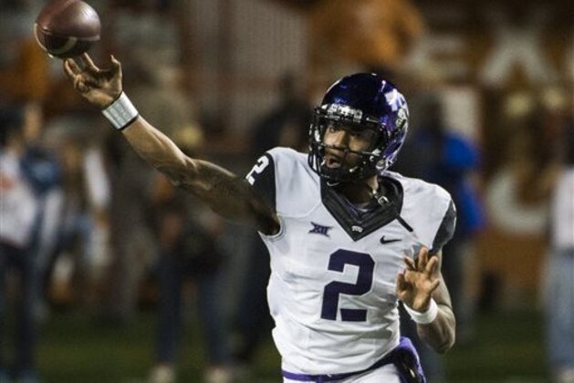 CORRECTS NAME OF TCU PLAYER TO TREVONE BOYKIN - TCU quarterback Trevone Boykin (2) throws a pass during the first half of an NCAA college football game against Texas, Thursday, Nov. 27, 2014, in Austin, Texas. (AP Photo/Ashley Landis)