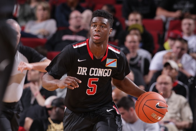 PORTLAND, OR - APRIL 12:  Emmanuel Mudiay #5 of the World Team dribbles the ball during the game against Team USA on April 12, 2014 at the Moda Center Arena in Portland, Oregon. NOTE TO USER: User expressly acknowledges and agrees that, by downloading and or using this photograph, user is consenting to the terms and conditions of the Getty Images License Agreement. Mandatory Copyright Notice: Copyright 2014 NBAE (Photo by Sam Forencich/NBAE via Getty Images)
