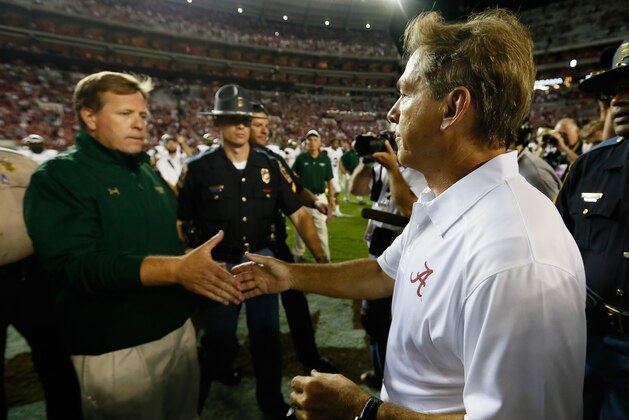 TUSCALOOSA, AL - SEPTEMBER 21:  Head coach Nick Saban of the Alabama Crimson Tide shakes hands with head coach Jim McElwain of the Colorado State Rams after their 31-6 win at Bryant-Denny Stadium on September 21, 2013 in Tuscaloosa, Alabama.  (Photo by Kevin C. Cox/Getty Images)