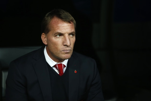 Liverpool's head coach Brendan Rodgers takes his seat before a Group B Champions League soccer match between Real Madrid and Liverpool at the Santiago Bernabeu stadium in Madrid, Spain, Tuesday Nov. 4, 2014. (AP Photo/Andres Kudacki)