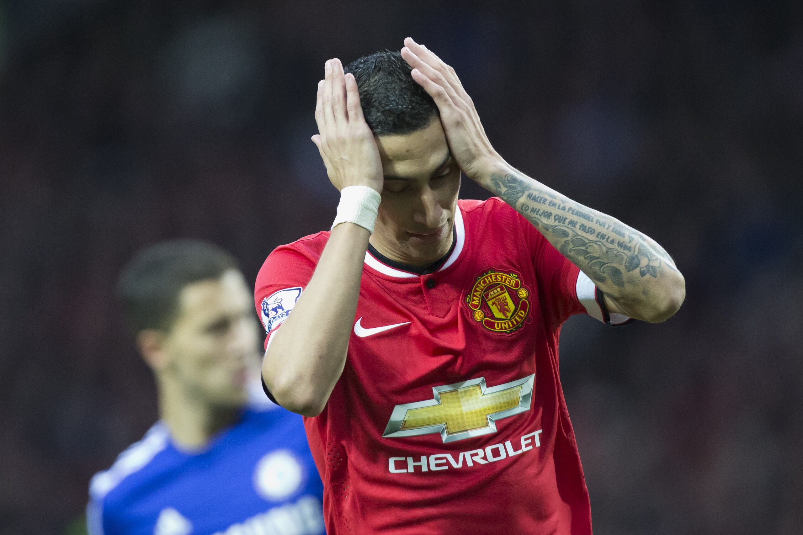 Manchester United's Angel Di Maria reacts after a missed opportunity during his team's English Premier League soccer match between Manchester United and Chelsea at Old Trafford Stadium, Manchester, England, Sunday Oct. 26, 2014. (AP Photo/Jon Super)