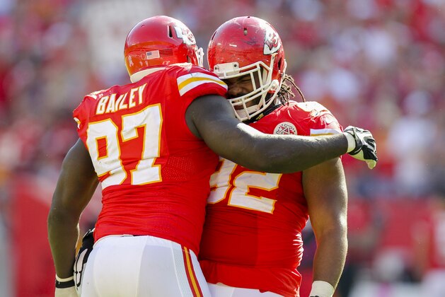 Kansas City Chiefs defensive end Allen Bailey (97) and Kansas City Chiefs nose tackle Dontari Poe (92) celebrate a sack of St. Louis Rams quarterback Austin Davis in the second half of an NFL football game in Kansas City, Mo., Sunday, Oct. 26, 2014. (AP Photo/Ed Zurga)