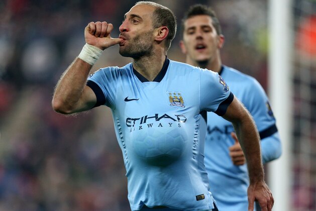 Manchester City's Pablo Zabaleta celebrates his goal during their English Premier League soccer match against Sunderland at the Stadium of Light, Sunderland, England, Wednesday, Dec. 3, 2014. (AP Photo/Scott Heppell)