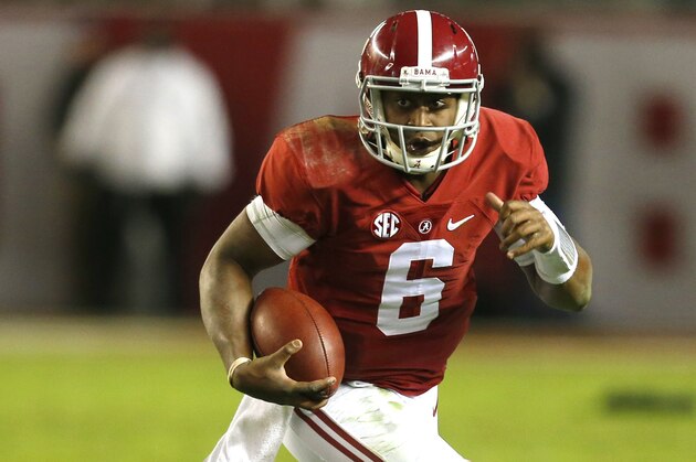 Alabama quarterback Blake Sims (6) runs for a first down during the second half of an NCAA college football game against Mississippi State on Saturday, Nov. 15, 2014, in Tuscaloosa, Ala. (AP Photo/Butch Dill)