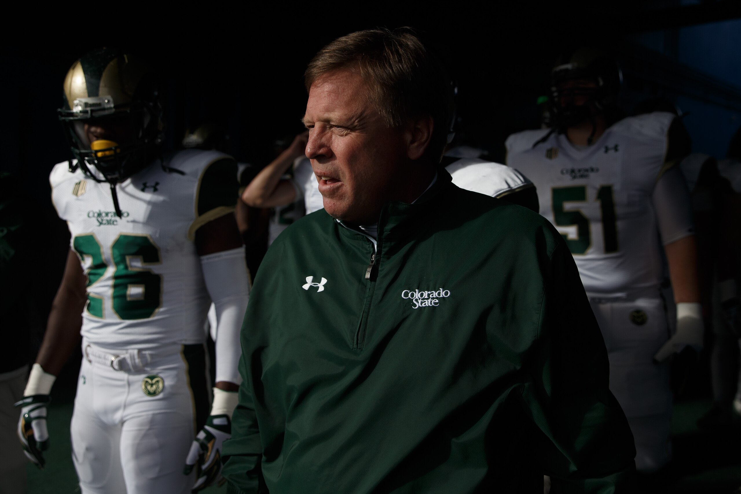 COLORADO SPRINGS, CO - NOVEMBER 28: Head Coach Jim McElwain of the Colorado State Rams leads his team out of the tunnel before a game against the Air Force Falcons at Falcon Stadium on November 28, 2014 in Colorado Springs, Colorado. (Photo by Justin Edmonds/Getty Images)