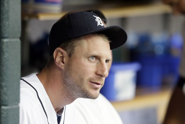 Detroit Tigers starting pitcher Max Scherzer is seen in the dugout during the first inning of a baseball game against the Cleveland Indians in Detroit, Friday, July 18, 2014. (AP Photo/Carlos Osorio)