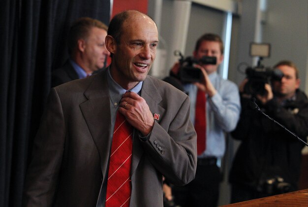 Dec 5, 2014; Lincoln, NE, USA; Nebraska Cornhuskers head coach Mike Riley adjusts his tie after being introduced at his press conference at Memorial Stadium. Mandatory Credit: Bruce Thorson-USA TODAY Sports