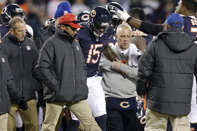 Chicago Bears wide receiver Brandon Marshall (15) walks off the field during the first half of an NFL football game against the Dallas Cowboys Thursday, Dec. 4, 2014, in Chicago. (AP Photo/Nam Y. Huh)