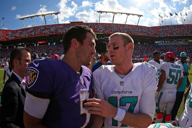MIAMI GARDENS, FL - OCTOBER 06: Ryan Tannehill #17 of the Miami Dolphins and Joe Flacco #5 of the Baltimore Ravens shake hands after a game  at Sun Life Stadium on October 6, 2013 in Miami Gardens, Florida.  (Photo by Mike Ehrmann/Getty Images)