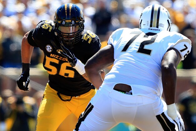 COLUMBIA, MO - SEPTEMBER 13:  Defensive lineman Shane Ray #56 of the Missouri Tigers rushes as offensive linesman Torrian Wilson #72 of the UCF Knights tries to block during the game at on September 13, 2014 at Faurot Field in Columbia, Missouri.  (Photo by Jamie Squire/Getty Images)