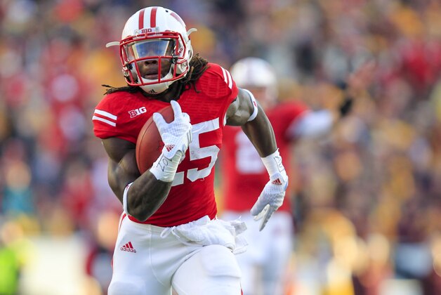 Wisconsin running back Melvin Gordon runs against Minnesota during the first half of an NCAA college football game Saturday, Nov. 29, 2014, in Madison, Wis. (AP Photo/Andy Manis)
