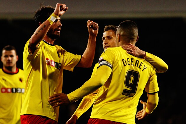 LONDON, ENGLAND - DECEMBER 05:  Troy Deeney (R) of Watford celebrates with team mates Almen Abdi (C) and Fernando Forestieri (L) after scoring his sides fifth goal during the Sky Bet Championship match between Fulham and Watford at Craven Cottage on December 5, 2014 in London, England.  (Photo by Ker Robertson/Getty Images)