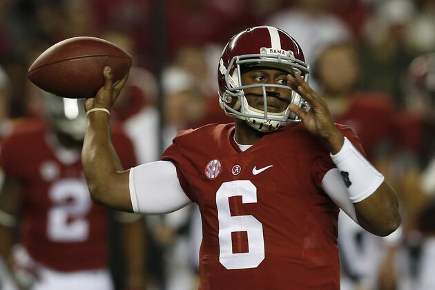 Alabama quarterback Blake Sims (6) plays against Auburn during the first half of the Iron Bowl NCAA college football game, Saturday, Nov. 29, 2014, in Tuscaloosa, Ala. (AP Photo/Butch Dill)