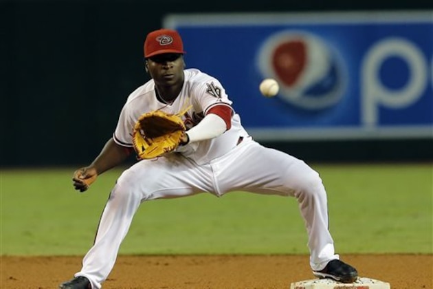 FILE - In this Sept. 15, 2014, file photo, Arizona Diamondbacks shortstop Didi Gregorius (1) gets the force out against the San Francisco Giants in the first inning of a baseball game in Phoenix. The New York Yankees have made their first big moves to reshape for 2015, agreeing to a $36 million, four-year contract with reliever Andrew Miller and obtaining Gregorius from Arizona as part of a three-team trade that sent right-hander Shane Greene to Detroit. (AP Photo/Rick Scuteri, File) FILE - In this Sept. 15, 2014, file photo, Arizona Diamondbacks shortstop Didi Gregorius (1) gets the force out against the San Francisco Giants in the first inning of a baseball game in Phoenix. The New York Yankees have made their first big moves to reshape for 2015, agreeing to a $36 million, four-year contract with reliever Andrew Miller and obtaining Gregorius from Arizona as part of a three-team trade that sent right-hander Shane Greene to Detroit. (AP Photo/Rick Scuteri, File)