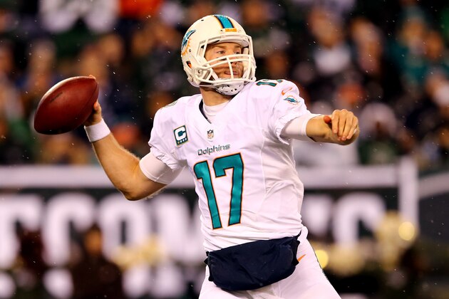 EAST RUTHERFORD, NJ - DECEMBER 01:   Ryan Tannehill #17 of the Miami Dolphins throws a pass in the first quarter against the New York Jets during their game at MetLife Stadium on December 1, 2014 in East Rutherford, New Jersey.  (Photo by Elsa/Getty Images)