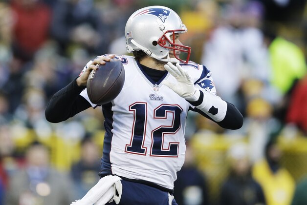 New England Patriots' Tom Brady during the first half of an NFL football game against the Green Bay Packers Sunday, Nov. 30, 2014, in Green Bay, Wis. (AP Photo/Tom Lynn)