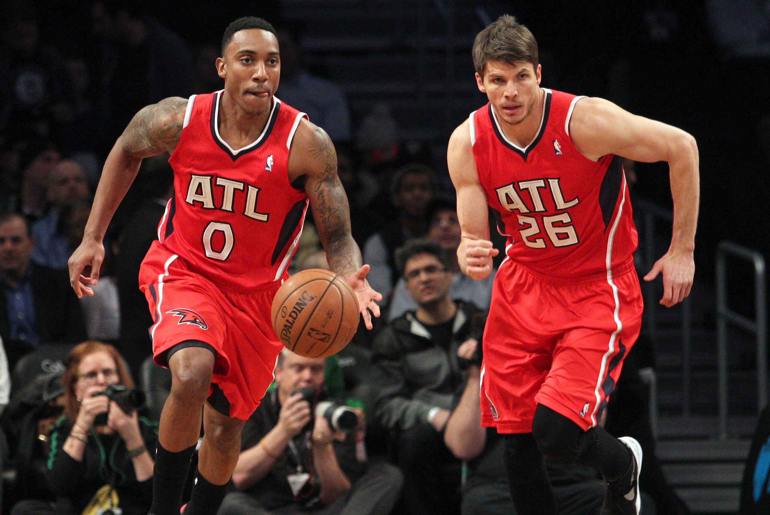 Jan 6, 2014; Brooklyn, NY, USA; Atlanta Hawks point guard Jeff Teague (0) and shooting guard Kyle Korver (26) bring the ball up court against the Brooklyn Nets during the first quarter of a game at Barclays Center. The Nets defeated the Hawks 91-86. Mandatory Credit: Brad Penner-USA TODAY Sports