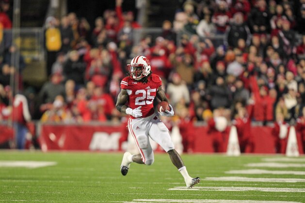 Wisconsin running back Melvin Gordon runs against Minnesota during the second half of an NCAA college football game Saturday, Nov. 29, 2014, in Madison, Wis. Wisconsin won 34-24. (AP Photo/Andy Manis)