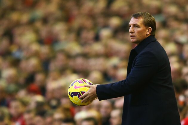 LIVERPOOL, ENGLAND - NOVEMBER 29:  Brendan Rodgers manager of Liverpool throws the ball during the Barclays Premier League match between Liverpool and Stoke City at Anfield on November 29, 2014 in Liverpool, England.  (Photo by Richard Heathcote/Getty Images)