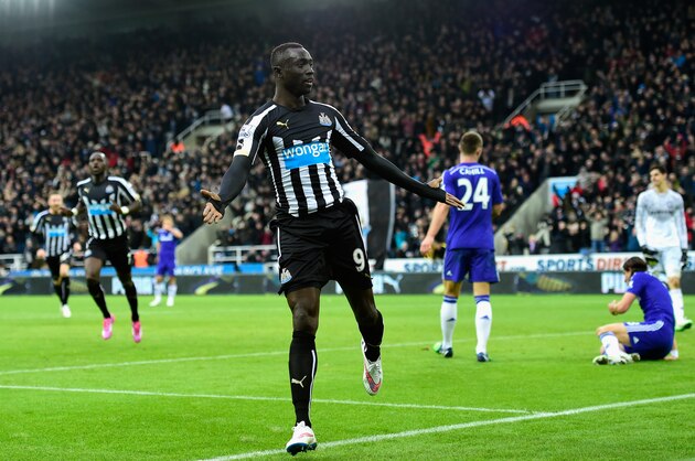 NEWCASTLE UPON TYNE, ENGLAND - DECEMBER 06:  Papiss Cisse of Newcastle  celebrates after scoring the second goal during the Barclays Premier League match between Newcastle United and Chelsea at St James' Park on December 6, 2014 in Newcastle upon Tyne, England.  (Photo by Stu Forster/Getty Images)