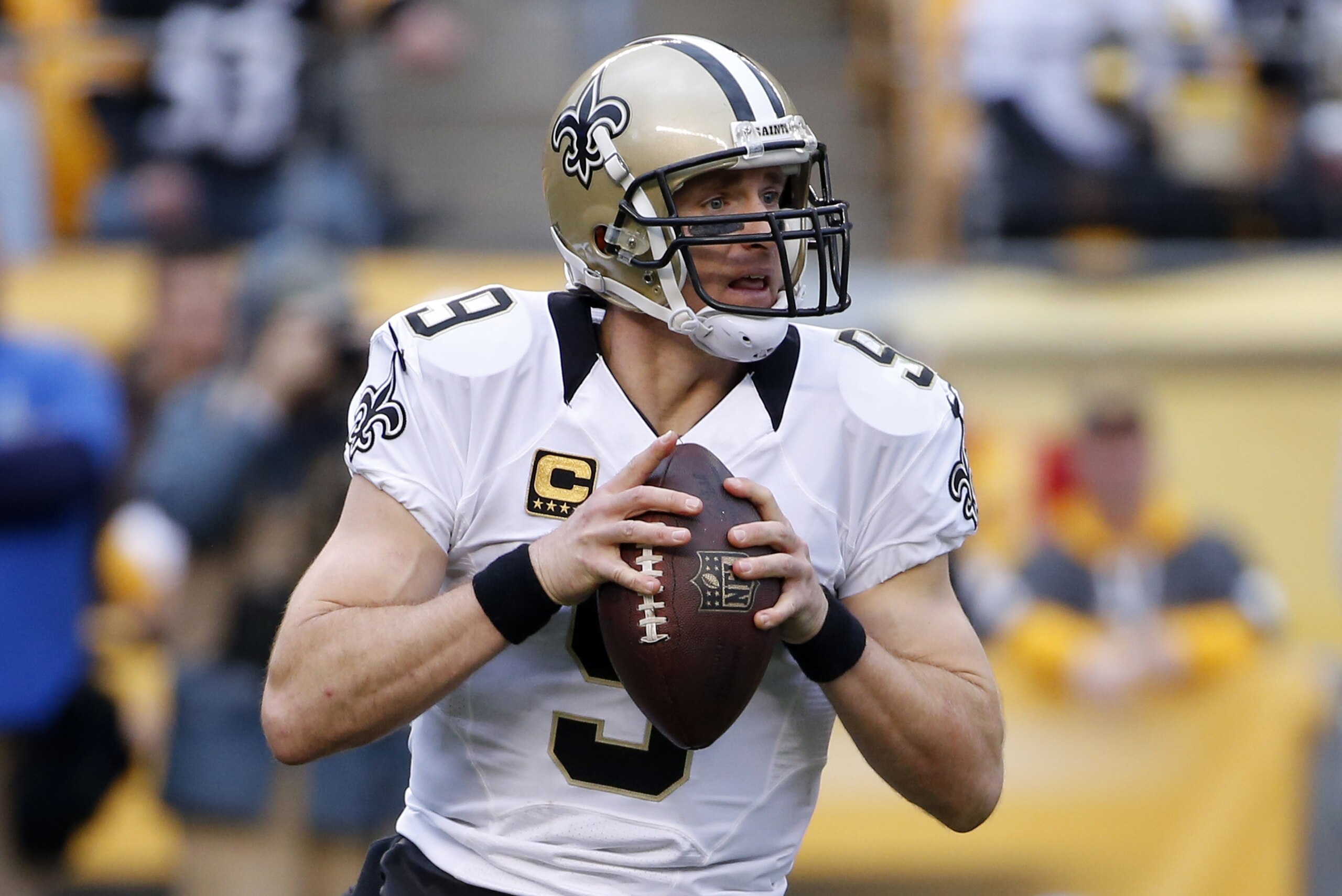 New Orleans Saints quarterback Drew Brees (9) looks to pass during the second half of an NFL football game against the Pittsburgh Steelers in Pittsburgh, Sunday, Nov. 30, 2014. (AP Photo/Gene J. Puskar)
