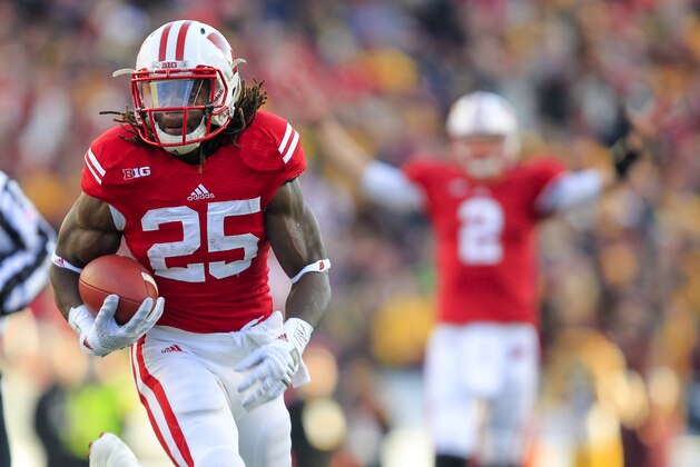 Wisconsin running back Melvin Gordon runs against Minnesota during the first half of an NCAA college football game Saturday, Nov. 29, 2014, in Madison, Wis. (AP Photo/Andy Manis) Wisconsin running back Melvin Gordon runs against Minnesota during the first half of an NCAA college football game Saturday, Nov. 29, 2014, in Madison, Wis. (AP Photo/Andy Manis)