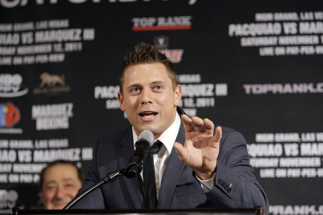 WWE Champion The Miz, center, speaks at a news conference to promote a world welterweight champioship bout between Manny Pacquiao, of the Philippines, and Juan Manuel Marquez, of Mexico, Pacquiao-Marquez III, in Beverly Hills, Calif., Wednesday, Sept. 7, 2011.  The fighters will meet Saturday, Nov. 12, 2011, at the MGM Grand in Las Vegas. (AP Photo/Reed Saxon)