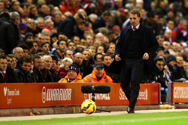 LIVERPOOL, ENGLAND - DECEMBER 06:  Brendan Rodgers, manager of Liverpool chases a ball during the Barclays Premier League match between Liverpool and Sunderland at Anfield on December 6, 2014 in Liverpool, England.  (Photo by Scott Heavey/Getty Images)