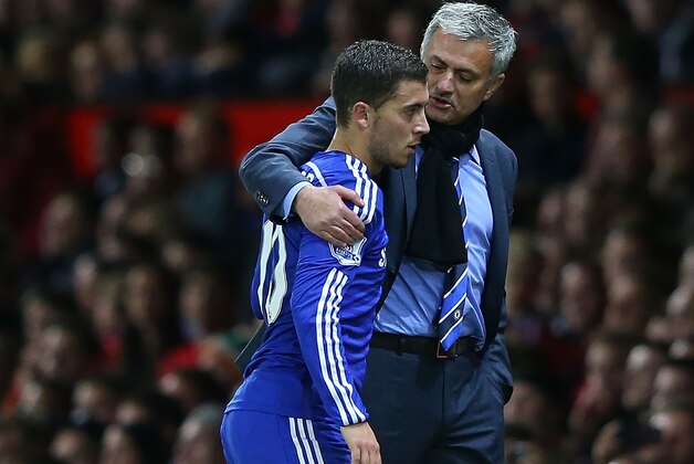 MANCHESTER, ENGLAND - OCTOBER 26:  Chelsea Manager Jose Mourinho embraces Eden Hazard during the Barclays Premier League match between Manchester United and Chelsea at Old Trafford on October 26, 2014 in Manchester, England.  (Photo by Alex Livesey/Getty Images)