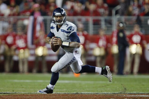 SANTA CLARA, CA - NOVEMBER 27:  Quarterback Russell Wilson #3 of the Seattle Seahawks looks for a receiver against the San Francisco 49ers late in the second quarter on November 27, 2014 at Levi's Stadium in Santa Clara, California.  The Seahawks won 19-3. (Photo by Brian Bahr/Getty Images)