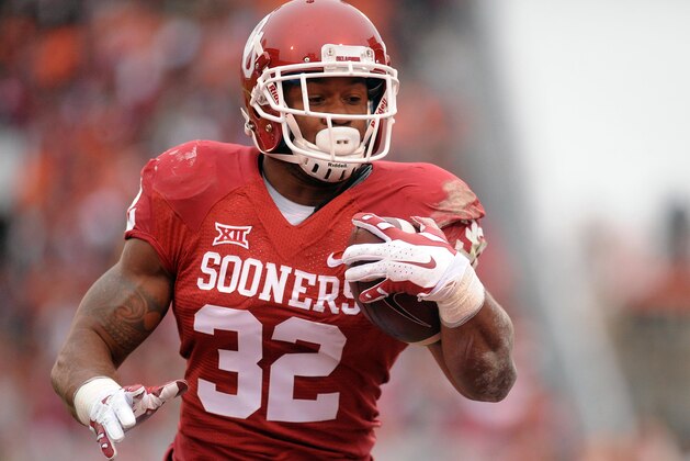 Dec 6, 2014; Norman, OK, USA; Oklahoma Sooners running back Samaje Perine (32) runs the ball for a touchdown against the Oklahoma State Cowboys during the first quarter at Gaylord Family - Oklahoma Memorial Stadium. Mandatory Credit: Mark D. Smith-USA TODAY Sports Dec 6, 2014; Norman, OK, USA; Oklahoma Sooners running back Samaje Perine (32) runs the ball for a touchdown against the Oklahoma State Cowboys during the first quarter at Gaylord Family - Oklahoma Memorial Stadium. Mandatory Credit: Mark D. Smith-USA TODAY Sports