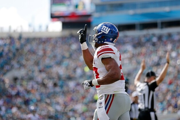 JACKSONVILLE, FL - NOVEMBER 30: Rashad Jennings #23 of the New York Giants reacts after scoring a touchdown during the first half of the game against the Jacksonville Jaguars at EverBank Field on November 30, 2014 in Jacksonville, Florida. (Photo by Rob Foldy/Getty Images) JACKSONVILLE, FL - NOVEMBER 30: Rashad Jennings #23 of the New York Giants reacts after scoring a touchdown during the first half of the game against the Jacksonville Jaguars at EverBank Field on November 30, 2014 in Jacksonville, Florida. (Photo by Rob Foldy/Getty Images)