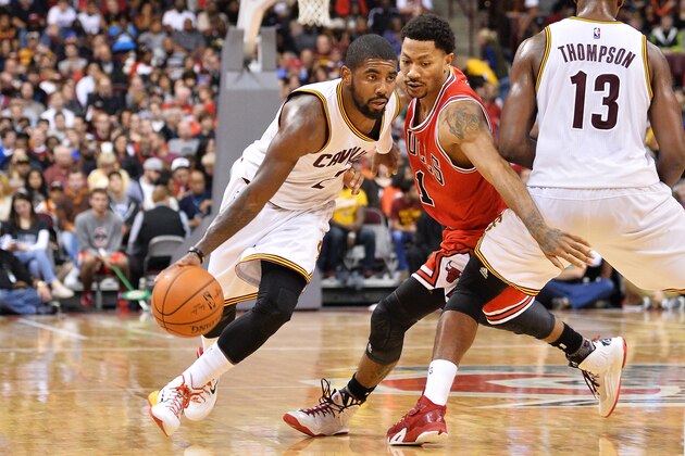 COLUMBUS, OH - OCTOBER 20:  Kyrie Irving #2 of the Cleveland Cavaliers drives around the defense of Derrick Rose #1 of the Chicago Bulls in the second half at the Jerome Schottenstein Center on October 20, 2014 in Columbus, Ohio. Cleveland defeated Chicago 107-98. NOTE TO USER: User expressly acknowledges and agrees that, by downloading and/or using this photograph, user is consenting to the terms and conditions of the Getty Images License Agreement.  (Photo by Jamie Sabau/Getty Images)