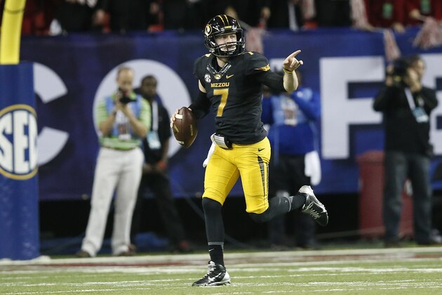 Missouri quarterback Maty Mauk (7) runs out of the pocket against Alabama during the first half of the Southeastern Conference championship NCAA college football game, Saturday, Dec. 6, 2014, in Atlanta. (AP Photo/Brynn Anderson )