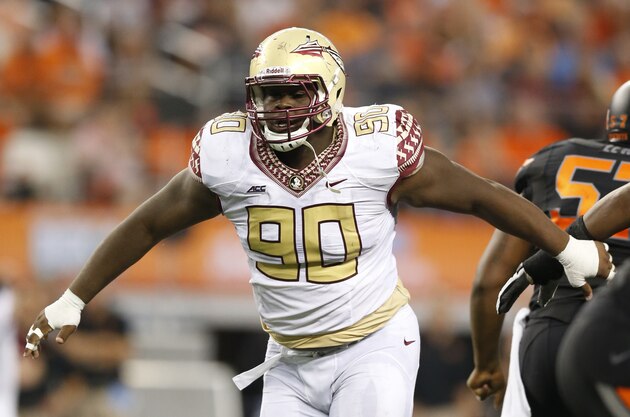 Aug 30, 2014; Arlington, TX, USA; Florida State Seminoles defensive tackle Eddie Goldman (90) in action against the Oklahoma State Cowboys at AT&T Stadium. Mandatory Credit: Matthew Emmons-USA TODAY Sports