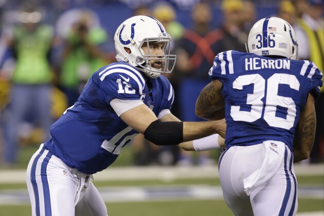 Indianapolis Colts quarterback Andrew Luck, left, hands off to running back Dan Herron during the first half of an NFL football game against the Washington Redskins Sunday, Nov. 30, 2014, in Indianapolis. (AP Photo/AJ Mast) Indianapolis Colts quarterback Andrew Luck, left, hands off to running back Dan Herron during the first half of an NFL football game against the Washington Redskins Sunday, Nov. 30, 2014, in Indianapolis. (AP Photo/AJ Mast)